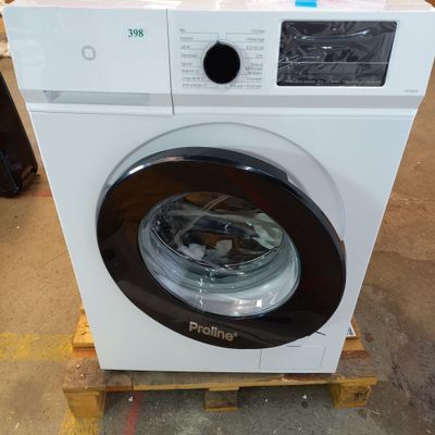 a washing machine sitting on a pallet in a warehouse