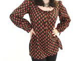 a woman standing with her hands on her hips