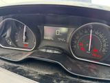 a close up of a car dashboard with a speedometer and gauges