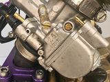 a close up of a carbuke on a motorcycle