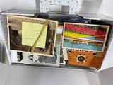 a suitcase that has a bunch of pictures in it