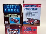 three boxes of toys that include a fire truck and a fire fighter