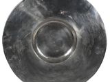 a silver plate with a tag on it