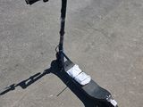 a scooter that is sitting on the pavement