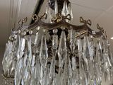 a chandelier hanging from the ceiling in a room