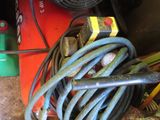 a bunch of hoses that are sitting on the ground