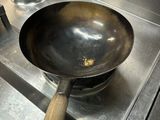 a frying pan on the stove in the kitchen