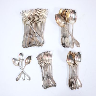 a lot of silver spoons and forks on the table