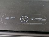 a close up of a black electronic device on a table