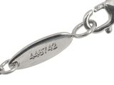 an image of a close up of a chain with a tag on it
