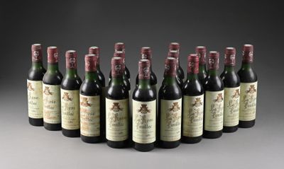 six bouteilles de vin alignées sur une surface grise