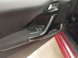 a close up of a door handle in a car