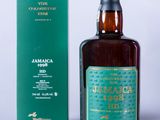 an image of a bottle of whisky next to a box