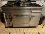 an image of a commercial kitchen with stainless steel appliances