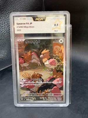 a close up of a pokemon card in a plastic case