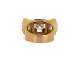 an image of a gold ring with a diamond in it