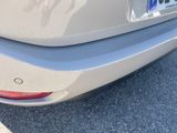 a close up of a car ' s rear end with a sticker on it
