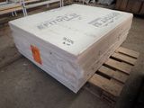 a mattress that is sitting on a pallet in a warehouse