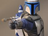 a close up of a star wars action figure with a gun