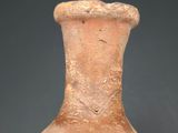 a small vase that is sitting on a table