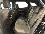 the back seats of a car are empty and the passenger seat is empty