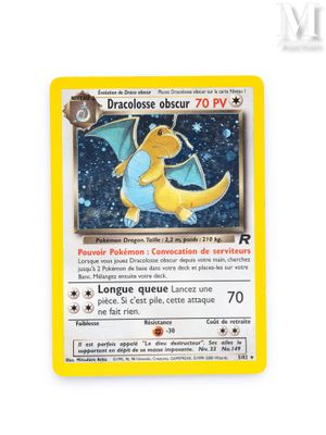 a close up of a pokemon card on a white surface