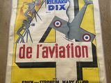 affiche de cinéma française représentant un avion survolant une ville