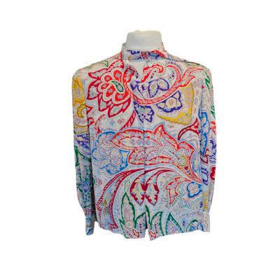 an image of a white shirt with multicolored flowers on it