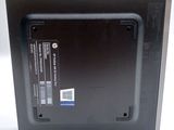 an image of a black laptop with a blue sticker on it