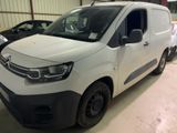 a white van that is parked in a garage