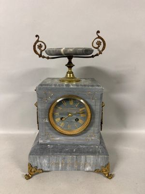 a clock that is sitting on top of a table
