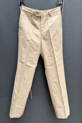 an image of a pair of beige pants hanging on a clothes line