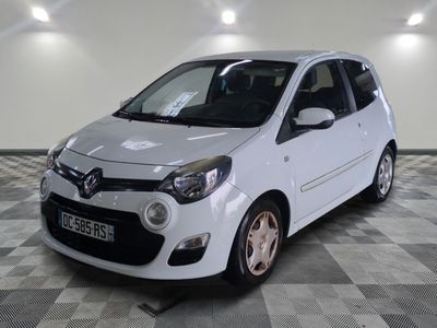 a picture of a white car parked in a garage