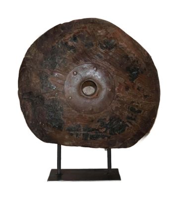 a large piece of metal on a stand on a white background