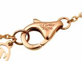 an image of a close up of a bracelet with a heart on it