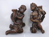 pair of antique bronze figurines of a boy and a girl with harps