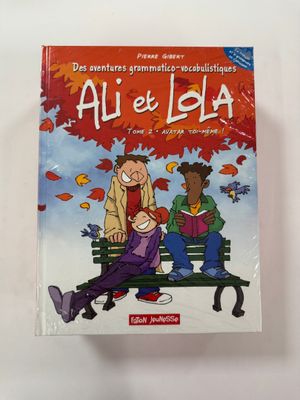 une image représentant un livre pour enfants avec une illustration de deux enfants assis sur un banc