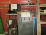 an image of a water heater in a garage