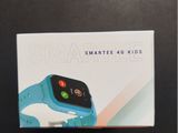 a box of smart watches sitting on top of a table