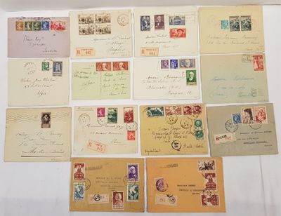 many different types of stamps and envelopes on a white surface