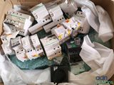 a box full of electrical equipment that is sitting on a table