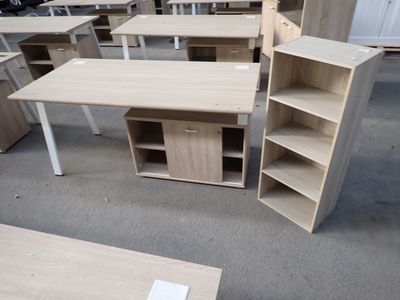 a lot of desks and shelves in a room