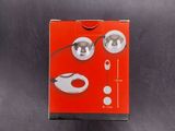 a red box with a pair of headphones in it