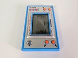 a small electronic device sitting on a white surface