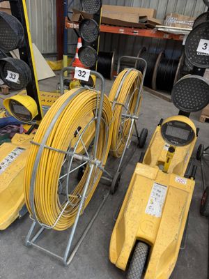 many different types of hoses and other equipment in a warehouse