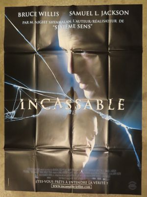 a movie poster of a man with a broken glass window