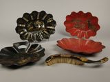 several different types of decorative objects are displayed on a white surface