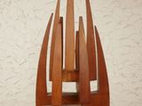 a wooden sculpture that is sitting on top of a table