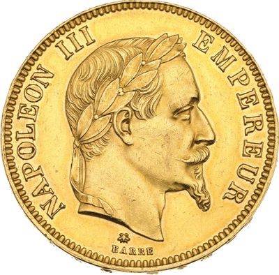 gros plan d'une pièce d'or sur laquelle figure le visage d'un homme