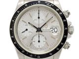 Montre Rolex avec cadran blanc et lunette noire